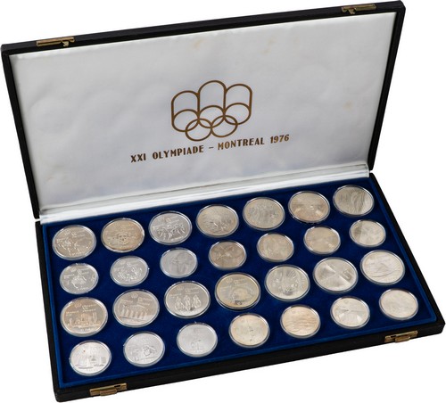 CANADA - Cofanetto contenente il giro completo delle 28 monete dedicate alla XXI Olimpiade di Montreal 1976.