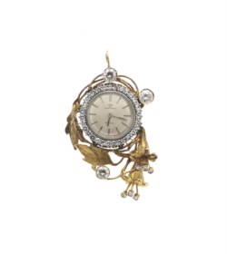 Orologio-spilla in oro giallo, Eternamatic