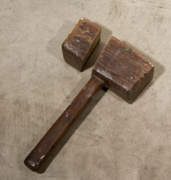 Reproduction of destruction (nature morte): hammer fall