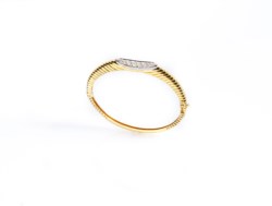 Bracciale rigido in oro giallo 18kt