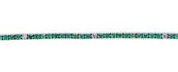 Bracciale tennis in oro bianco 18kt, smeraldi e diamanti