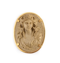 Gold brooch with lava stone cameo