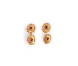 Buccellati, pair of gold cufflinks with cabochon rubies, ca. 1960