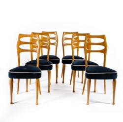 Six sculptural chairs in ash wood